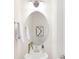 Elegant powder room featuring a pedestal sink and a modern oval mirror at 11032 Gary Player Dr # 961, Lancaster, SC 29720