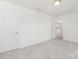 Light-filled bedroom featuring plush carpeting and a doorway to another area, providing comfort and accessibility at 11032 Gary Player Dr # 961, Lancaster, SC 29720