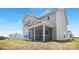 View of house with screened in patio with a blue sky background at 11032 Gary Player Dr # 961, Lancaster, SC 29720