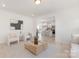 Open-concept living room showcasing seamless transition to the modern kitchen at 11032 Gary Player Dr # 961, Lancaster, SC 29720