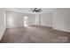 Bright bedroom with ceiling fan, plush carpet, and neutral walls to personalize at 111 Bell Chase Ln, Statesville, NC 28677