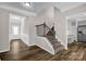 Entryway with staircase leading to upper level and view of kitchen area at 111 Bell Chase Ln, Statesville, NC 28677