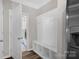 Mudroom featuring built-in storage bench with coat hooks and shelving at 111 Bell Chase Ln, Statesville, NC 28677