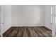 Well-lit room with hardwood floors and white trim, offering a versatile space for an office or study at 111 Bell Chase Ln, Statesville, NC 28677