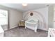 Bedroom with decorative rainbow wall, neutral carpet, and a white crib at 116 Dublin Ct, Statesville, NC 28677