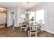 Charming dining room with an oval table, chandelier, and window with natural light at 116 Dublin Ct, Statesville, NC 28677