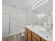 Bright bathroom features double vanity, large mirror, and separate shower and tub at 118 Glade Valley Ave, Mooresville, NC 28117