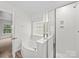 Bright bathroom featuring a tub and a shower at 118 Glade Valley Ave, Mooresville, NC 28117