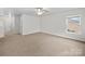 Bedroom with neutral carpet and fan at 118 Glade Valley Ave, Mooresville, NC 28117