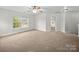 Bright, neutral bedroom with large window and spacious layout at 118 Glade Valley Ave, Mooresville, NC 28117