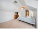 Bright bedroom features vaulted ceilings, neutral carpet, and a ceiling fan at 11929 Parks Farm Ln, Charlotte, NC 28277