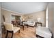 Cozy living room featuring hardwood floors, neutral walls, and stylish furniture at 11929 Parks Farm Ln, Charlotte, NC 28277