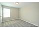 Standard bedroom with carpet, window and door at 1309 Afternoon Sun Rd, Matthews, NC 28104