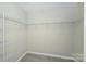 Walk-in closet features carpet flooring, neutral walls and wire shelving at 1309 Afternoon Sun Rd, Matthews, NC 28104