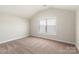 Comfortable bedroom with carpet and window, perfect for relaxing and unwinding at 136 Adams Tree Way, Troutman, NC 28166