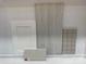 Image shows design materials, including a white cabinet door, stone countertop, floor, and square tiles at 14703 Keyes Meadow Way, Huntersville, NC 28078