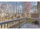 Relax on this outdoor deck that overlooks a wooded area at 16911 Commons Creek Dr, Charlotte, NC 28277