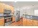 Well-equipped kitchen with stainless steel appliances and ample cabinet space at 16911 Commons Creek Dr, Charlotte, NC 28277