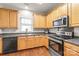 Beautiful kitchen featuring modern appliances, cabinets and granite countertops at 16911 Commons Creek Dr, Charlotte, NC 28277