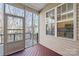 Enjoy the seasons on this screened porch with outdoor flooring at 16911 Commons Creek Dr, Charlotte, NC 28277
