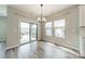 Bright dining area with sliding glass door, perfect for entertaining at 1819 Lotus Ln, Denver, NC 28037
