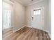 A quaint foyer boasting hardwood floors and white trim at 1819 Lotus Ln, Denver, NC 28037