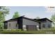 Single-story home with sleek siding, a two-car garage, and a well maintained lawn and landscaping at 1935 Weddington Rd # 1, Matthews, NC 28104