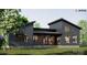 Rear exterior elevation of a modern home with a covered patio, large windows, and sleek, modern siding at 1935 Weddington Rd # 1, Matthews, NC 28104