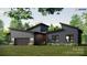 Charming single-story modern home featuring a two-car garage, and well-manicured landscaping at 1935 Weddington Rd # 1, Matthews, NC 28104