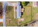 Aerial view of property with fenced backyard, deck, and fire pit area, ideal for outdoor living at 2704 Silvers Ln, Albemarle, NC 28001