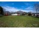 Spacious, well-maintained backyard with a fence, offering ample space for outdoor activities at 2704 Silvers Ln, Albemarle, NC 28001