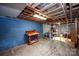 Spacious unfinished basement with exposed ceiling, concrete block walls, and potential for customization at 2704 Silvers Ln, Albemarle, NC 28001