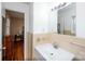 This bathroom includes a well-lit vanity area with a clean aesthetic and functional storage at 2704 Silvers Ln, Albemarle, NC 28001