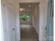 Light-filled home entrance featuring hardwood floors and modern fixtures at 29069 Low Country Ln # 602, Lancaster, SC 29720