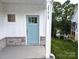 Charming light-blue front door with stone accents and house number at 29069 Low Country Ln # 602, Lancaster, SC 29720