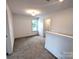 Upstairs landing with window and neutral carpet at 29069 Low Country Ln # 602, Lancaster, SC 29720