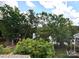 A view of the lake or river surrounded by dense woods from the roof of the house at 29069 Low Country Ln # 602, Lancaster, SC 29720
