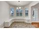 Charming breakfast nook with built-in bench seating and natural light at 3316 Creek Trail Rd, Indian Trail, NC 28079