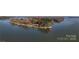 Aerial shot of lake home on a peninsula surrounded by water, offering privacy and scenic views at 340 Topsail Rd, Salisbury, NC 28146