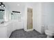 Bright bathroom with double sink, tile flooring, and standing shower at 340 Topsail Rd, Salisbury, NC 28146