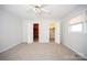 Neutral bedroom featuring two walk-in closets with doors wide open and carpet flooring at 340 Topsail Rd, Salisbury, NC 28146