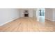Spacious living room featuring hardwood floors, a stone fireplace, and neutral paint at 340 Topsail Rd, Salisbury, NC 28146