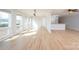Open-concept living room with hardwood floors and large windows offering plenty of natural light at 340 Topsail Rd, Salisbury, NC 28146
