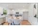 Kitchen featuring white cabinets, stainless steel appliances, and an island with seating at 4046 Jenison Valley Ct, Charlotte, NC 28214