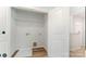 Laundry room featuring a wire shelf, connections for washer and dryer, and vinyl flooring at 4046 Jenison Valley Ct, Charlotte, NC 28214
