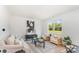 Bright living room with modern furnishings, natural light, and a large graphic art piece at 4046 Jenison Valley Ct, Charlotte, NC 28214
