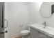Bathroom with a modern vanity, a toilet, and a mirror at 412 Montana Dr, Gastonia, NC 28056