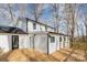 Charming home exterior with a spacious deck and beautifully landscaped yard at 412 Montana Dr, Gastonia, NC 28056
