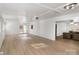 Open living room with wood floors that connects to a cozy, well-lit sitting area at 412 Montana Dr, Gastonia, NC 28056