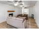 Comfortable living room featuring a brick fireplace and neutral decor at 412 Montana Dr, Gastonia, NC 28056